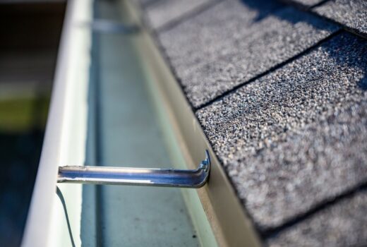 clean empty gutter on side of roof - A1 Pro Roofing Ottawa Kanata Orleans