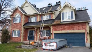 roofing project complete, ladder leads up to second story, shingles sit atop roof, roofing in progress - A1 Pro Roofing Ottawa Kanata Orleans