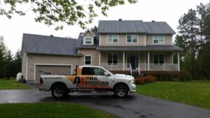 roofing project complete, A1 Pro Roofing truck sits in driveway - A1 Pro Roofing Ottawa Kanata Orleans